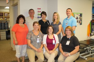 The WCH Rehabiliation Therapy Team pctured (L-R): Front Row: Amy Ramsey, OTR/L, Ashley Beavers, COTA, Kristy Demry, PTA; Back row: Belinda Adkins, EMT/PT Tech, Ted Roush, CCC/SLP, Debbie Hullinger, PTA, Alyssa Wilson, PT, and Eric Palmer, DPT. (Not pictured David Carroll, PT;Choel Christian, PTA; Mary Echterling, OTR/L and Joel Petty, PTA/ATC)
