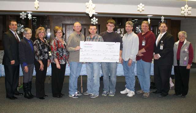 The Plant Operations Department accepts a check for $10,000 from the Auxiliary Gift Shop. (L-R) Daren Relph, CEO; Tracy Thomas, President, Denise Hook, CFO, Bonita Wells, Gift Shop Manager, Brad Willey, Plant Operations Director, Don Skinner, Plant Operations, Aaron Brown, Plant Operations, Aaron Hoelting, Plant Operations, Dale Clark, Plant Operations, Mike Thomas, Associate Administrator, and Georgia Runyon, Secretary. 